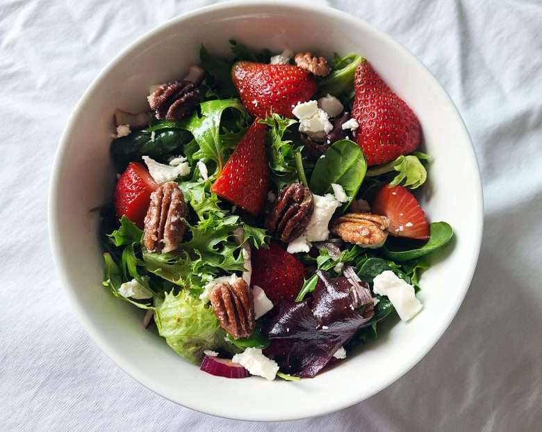 Spring strawberry salad with pomegranate dressing